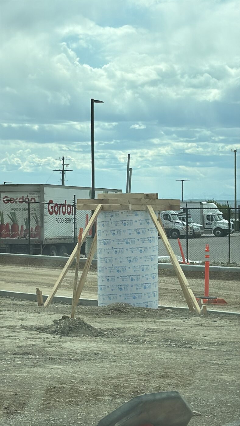 Estructura de madera para curado de concreto